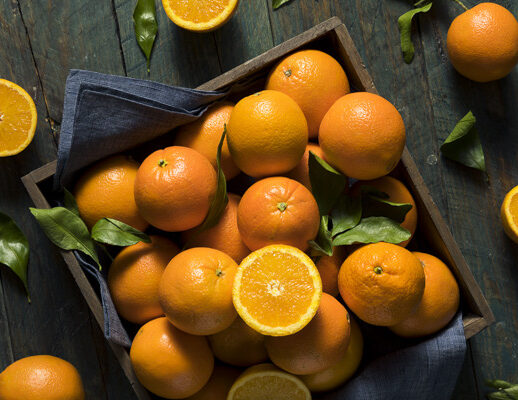 Raw Organic Orange Oranges in a Basket